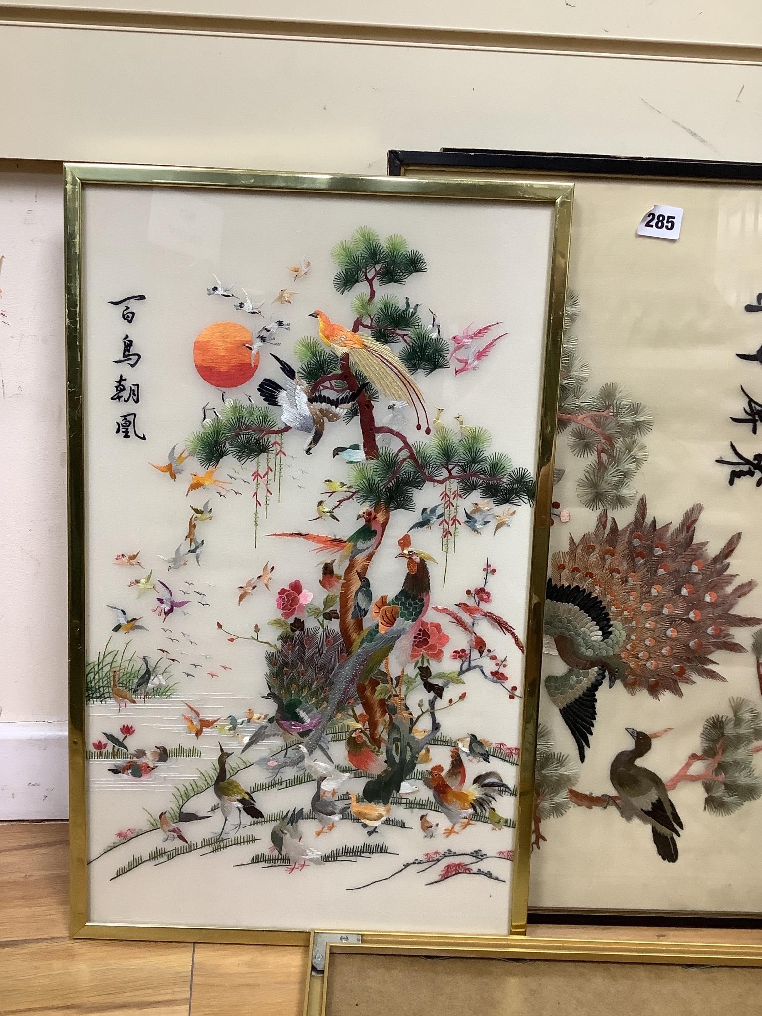 A Chinese silkwork panel of flowers and three other panels